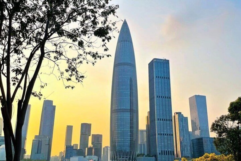A city skyline with modern skyscrapers and a prominent, pointed building. 4