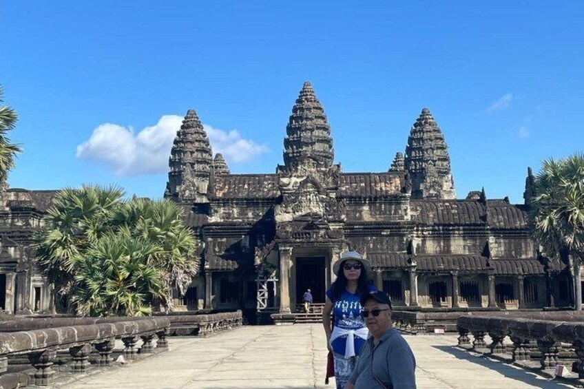 Angkor Wat temple complex with three main towers and a central entrance. 4