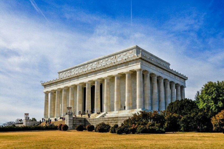 The Lincoln Memorial with a clear blue sky. 5