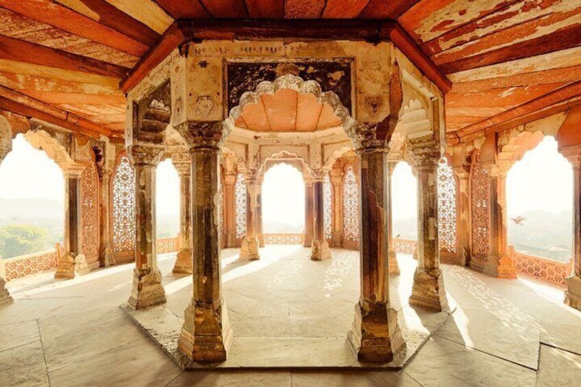 An ornate architectural structure with arches and columns, likely a historical building or palace. 2