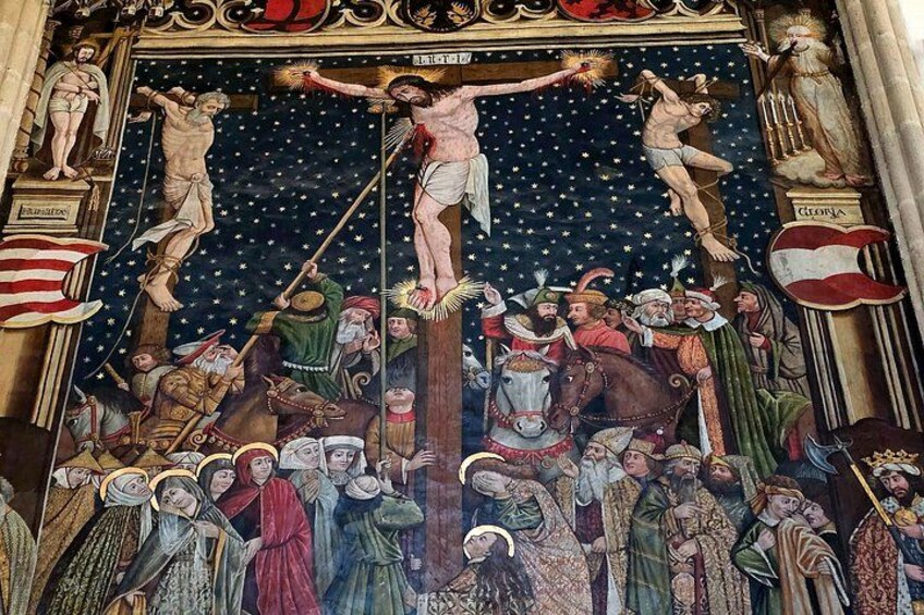A detailed mural with religious figures, a central crucifixion scene, and a starry background. 2