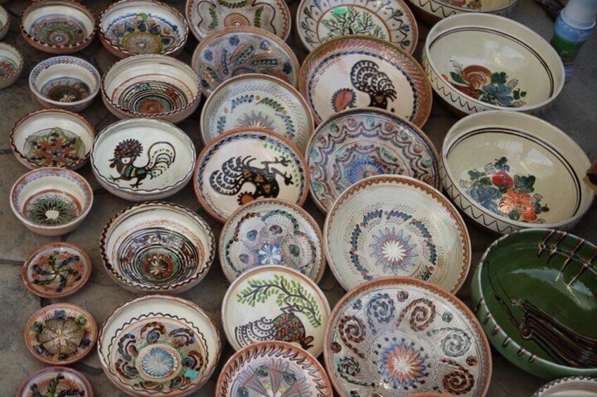 A collection of intricately decorated ceramic plates. 2