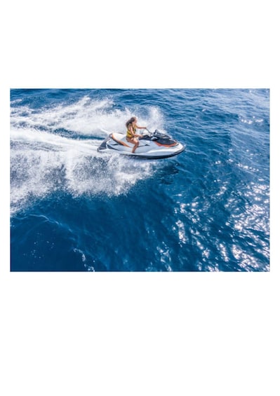 A person jet-skiing on a body of water. 2