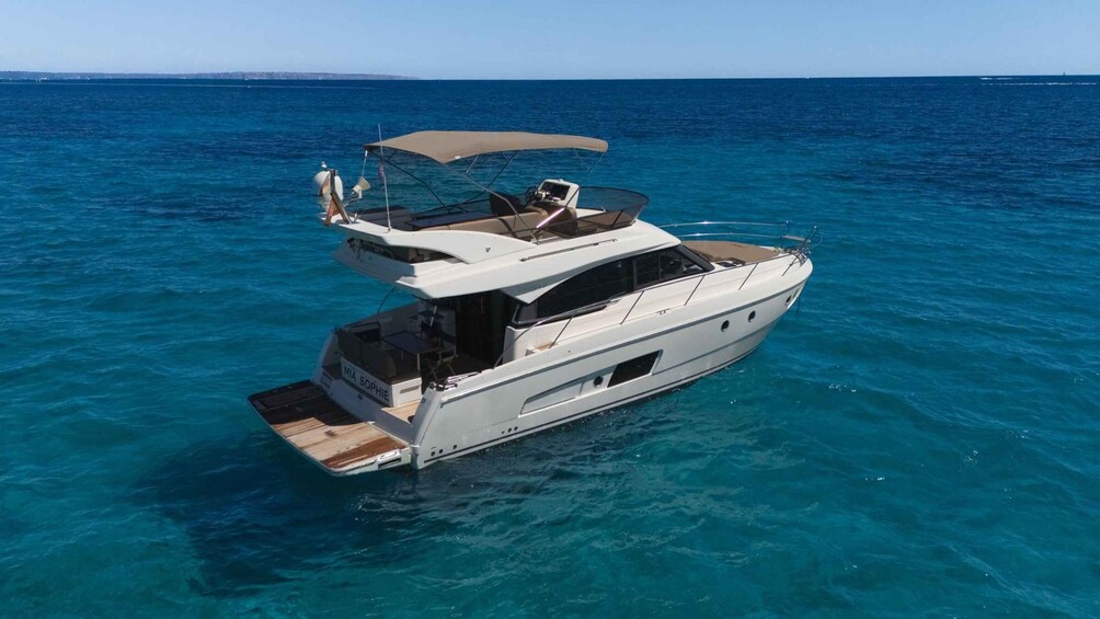 A yacht named 'MIA SOPHIE' anchored in clear blue waters. 2