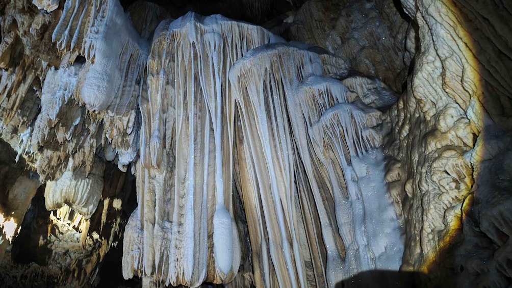 Stalactites hanging from a cave ceiling. 2