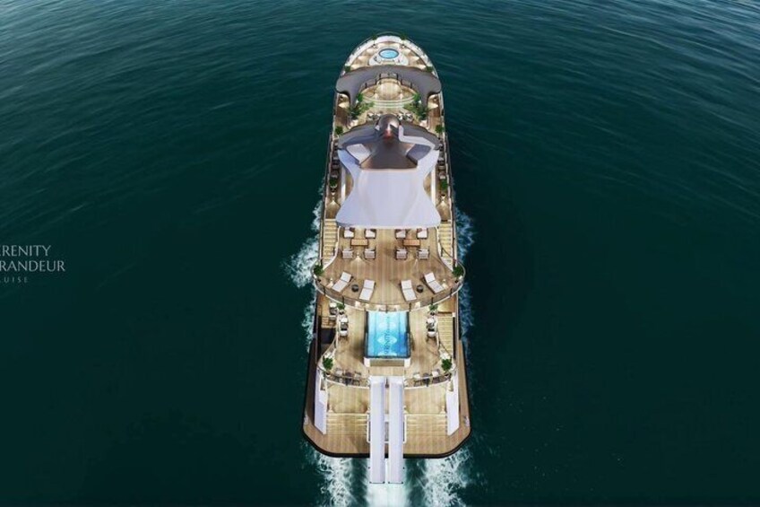 A cruise ship with a pool, sun loungers, and a covered deck area. 2