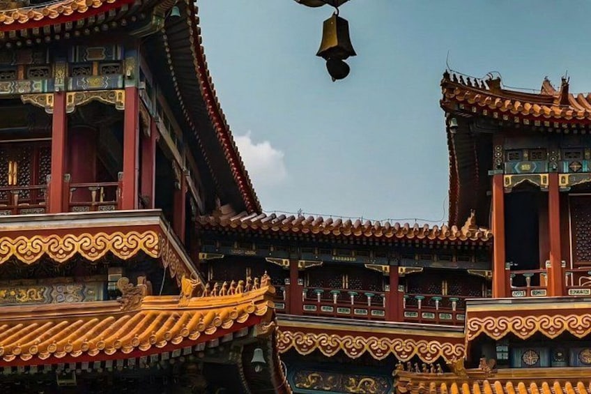 Traditional Chinese architecture with ornate roofs and golden accents. 2
