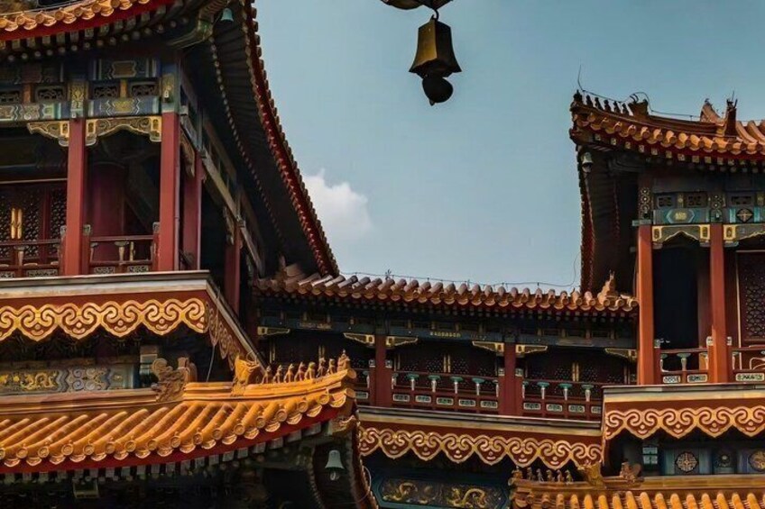 Traditional Chinese architecture with ornate roofs and golden accents. 2