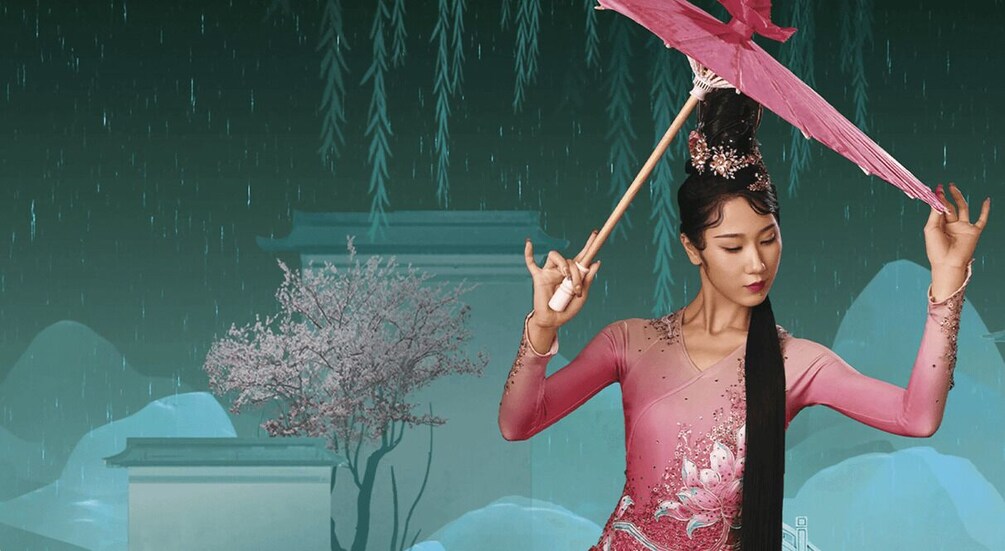 A person in traditional attire holding a pink umbrella, with cherry blossoms and a pagoda in the background. 3
