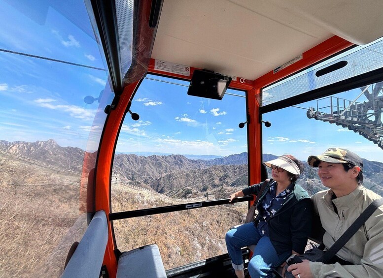 A vehicle with a view of a mountainous landscape. 2