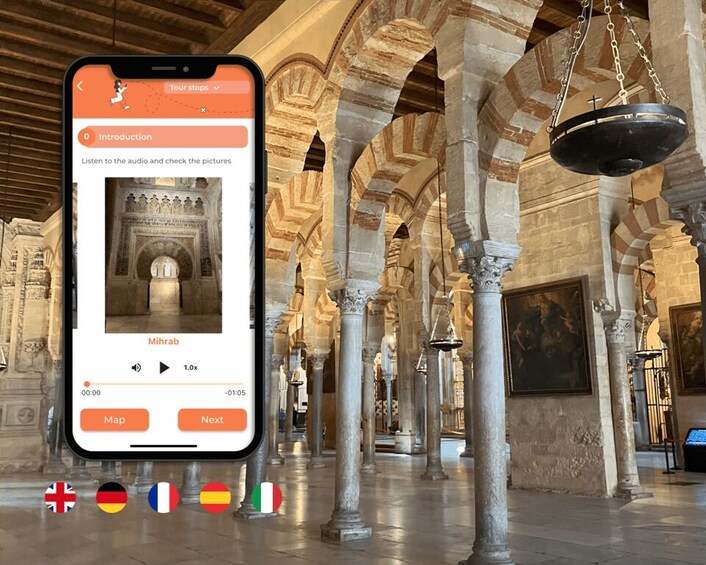 A smartphone displaying a tour app with a view of a grand architectural interior featuring arches and columns. 1