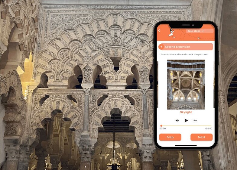A smartphone displaying a tour stop with a photo of a building's intricate arches and columns. 2