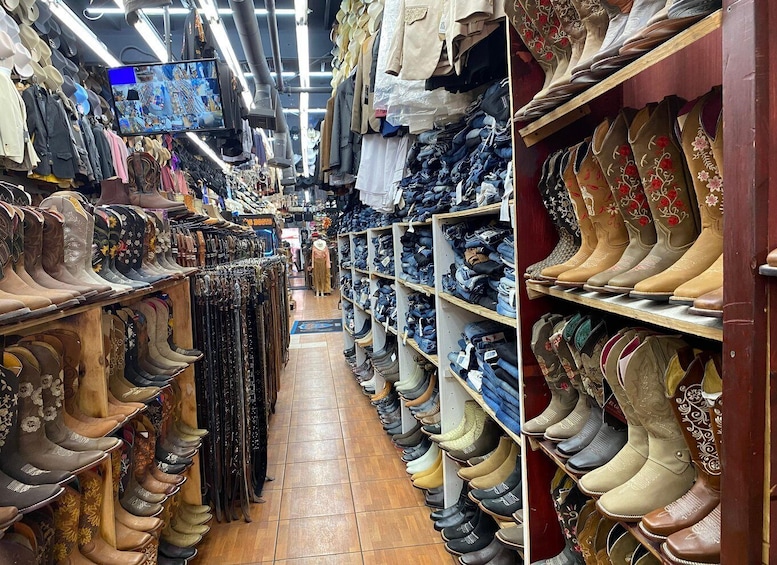 A shoe store with various types of footwear on display. 2