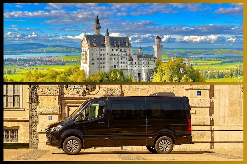 A black van parked in front of a historic building with towers and a view of a lake and town in the background. 1