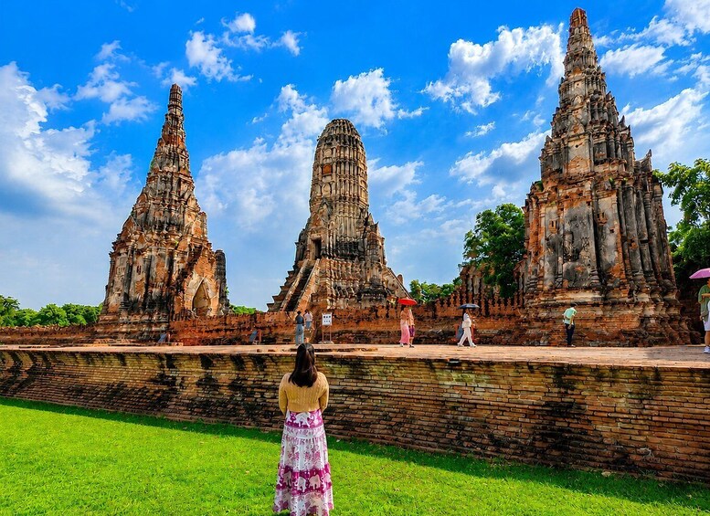 A temple complex with three large, intricately carved towers. 5
