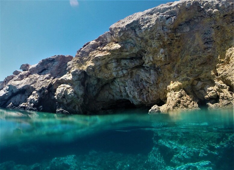 A rocky coastline with clear turquoise water. 4