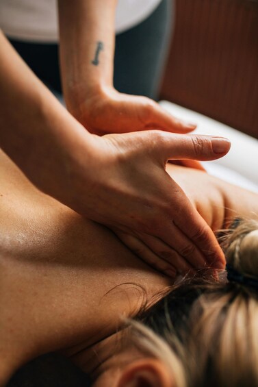 A person receiving a massage. 5