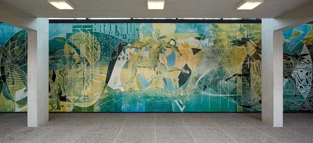 A large abstract mural with geometric shapes and patterns. 1