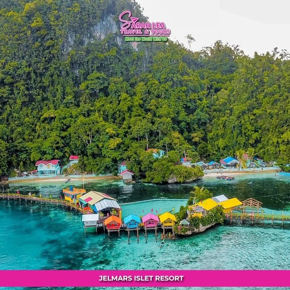 A coastal area with colorful houses on stilts over water, surrounded by dense forest. 5