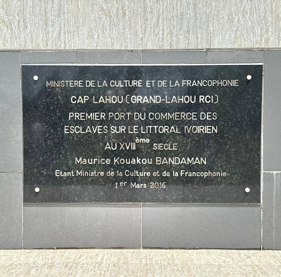 A commemorative plaque mounted on a wall. 2