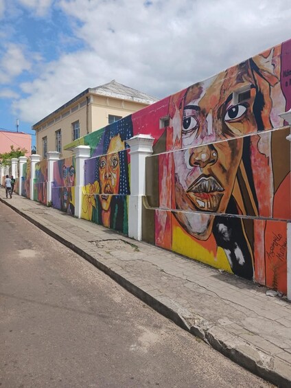 A colorful mural on a building's facade. 4