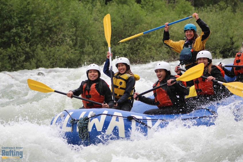 A group of people rafting on a river. 1