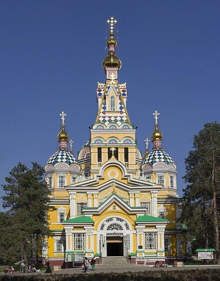 A colorful Orthodox church with multiple domes and crosses. 2