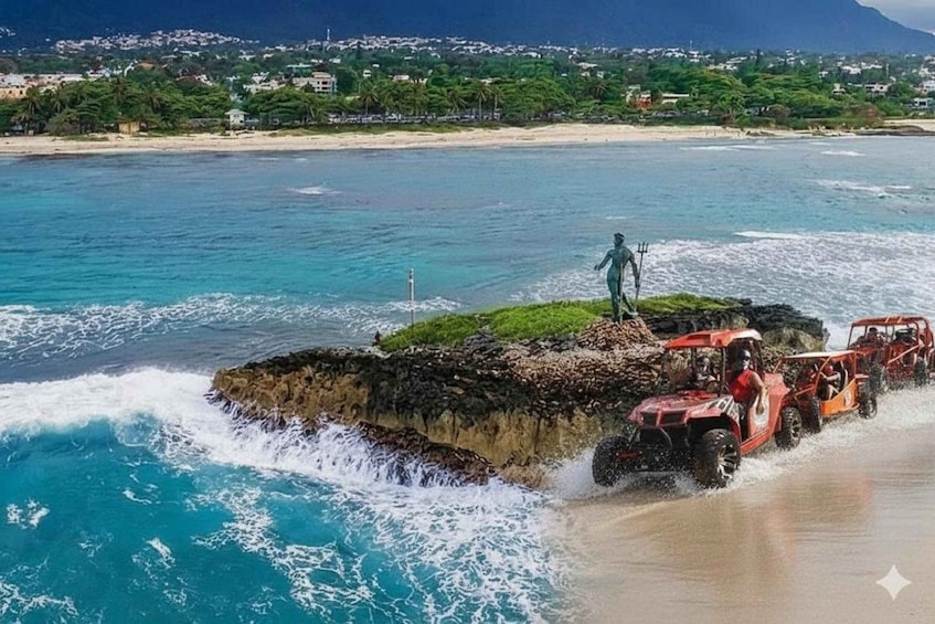 A coastal scene with a rocky outcrop, a statue, and a red off-road vehicle on the beach. 1