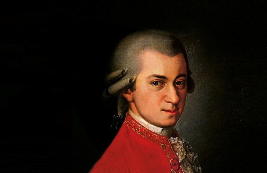 A portrait of a person in a red military uniform with gold embroidery. 5