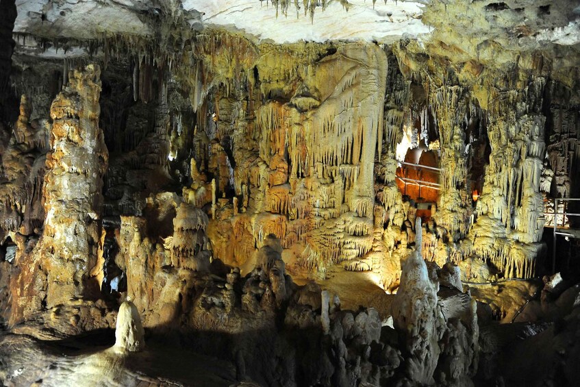 A cave with stalactites and stalagmites. 2