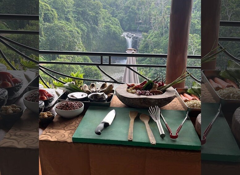 A meal setup with a view of a waterfall. 3