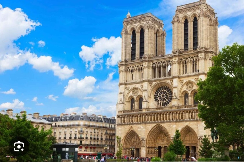 Notre-Dame Cathedral with twin towers and a large rose window. 3
