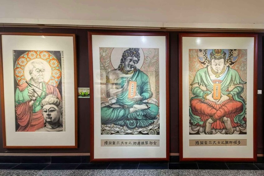 Three framed artworks depicting seated figures with inscriptions. 3