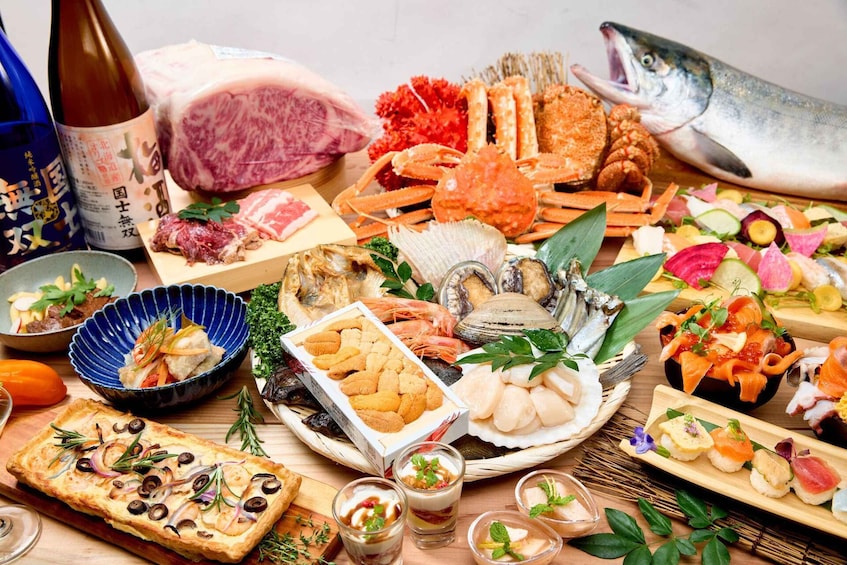 A variety of seafood including fish, crab, and shrimp, arranged on a wooden table. 3