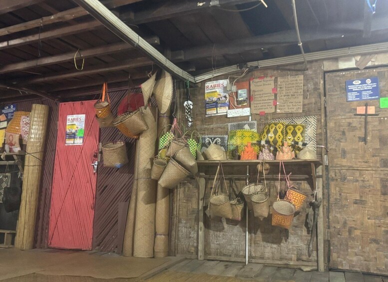 A shop with woven baskets and mats on display. 3