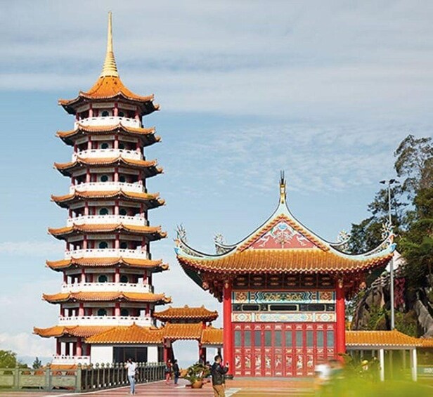 A traditional multi-tiered pagoda and a red temple with ornate architecture. 5