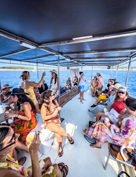 People on a boat with a view of the sea. 3