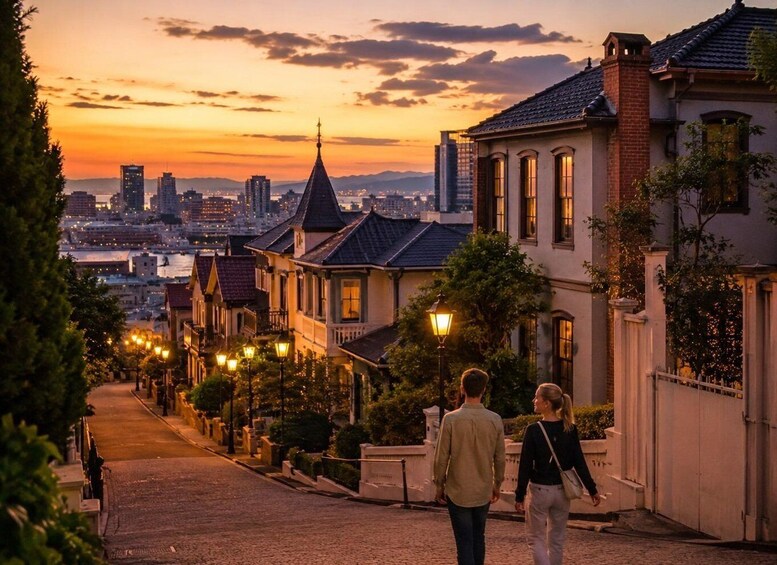 A couple walking down a cobblestone street lined with historic buildings and street lamps. 2
