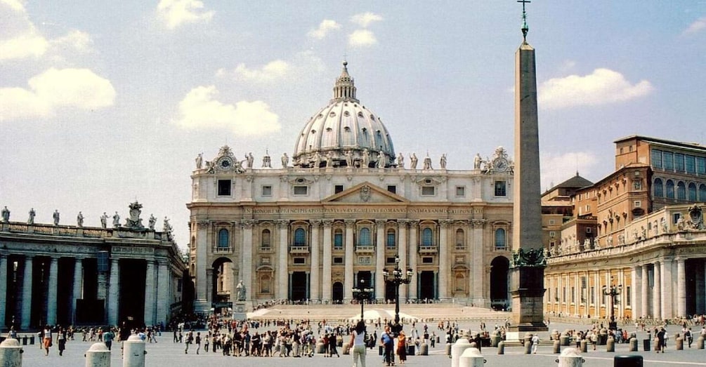St. Peter's Basilica with its large dome and the obelisk in St. Peter's Square. 3