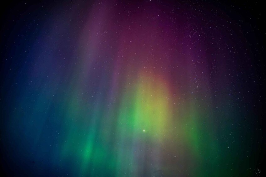 The Northern Lights with a green center and purple edges. 2