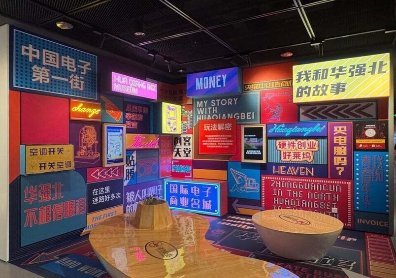 A vibrant indoor space with neon signs and illuminated displays, including one that says 'MONEY' and another with 'MY STORY WITH HUAIGANGBEI'. 3