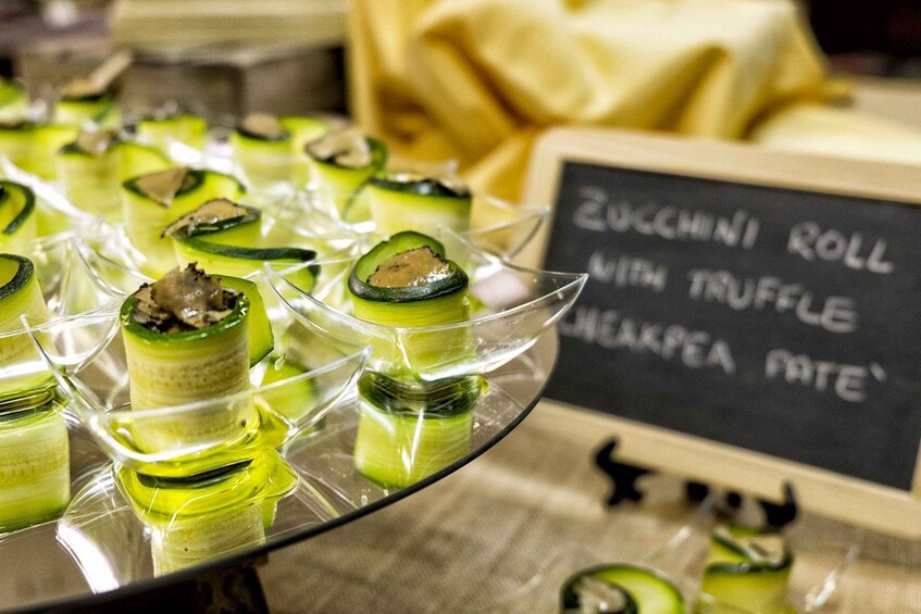 A display of zucchini rolls with truffle and mascarpone cheese. 5