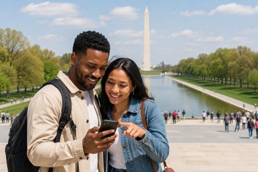 A couple standing in front of the Washington Monument with a river and trees in the background. 3