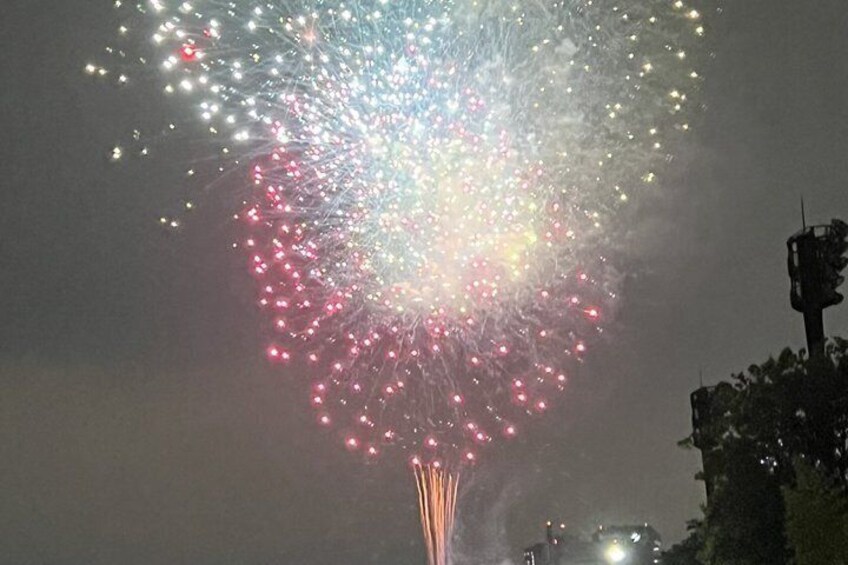 A night sky with a heart-shaped firework display. 5