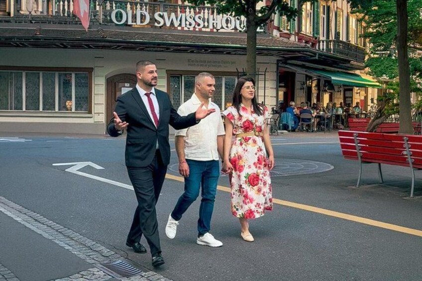 A street with a building labeled 'OLD SWISS HOUSE' in the background. 1