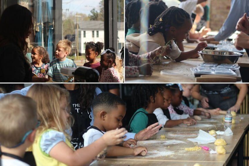 Children engaged in a cooking activity, with ingredients and utensils on the table. 1