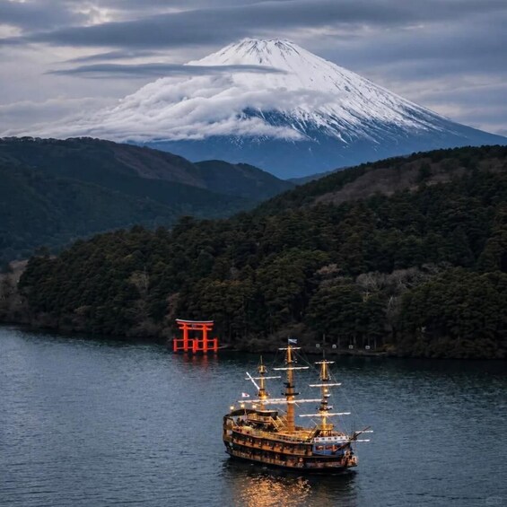 A ship on water with a mountain in the background. 4