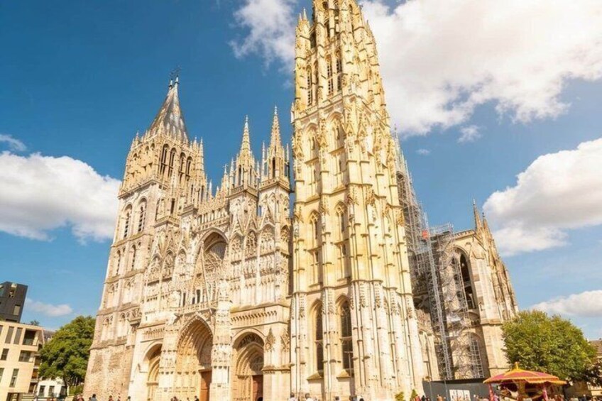 A Gothic cathedral with intricate stonework and a tall spire. 5