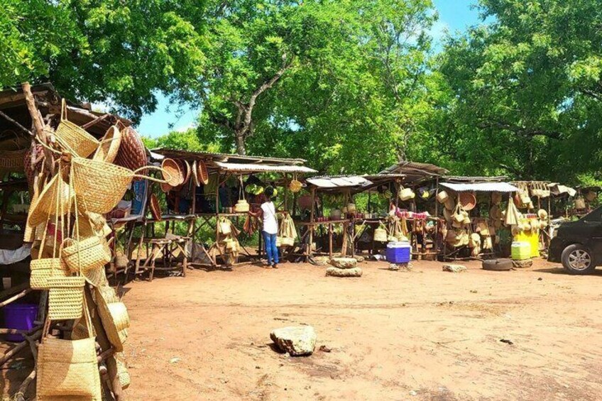 A market with handmade baskets and woven goods. 4