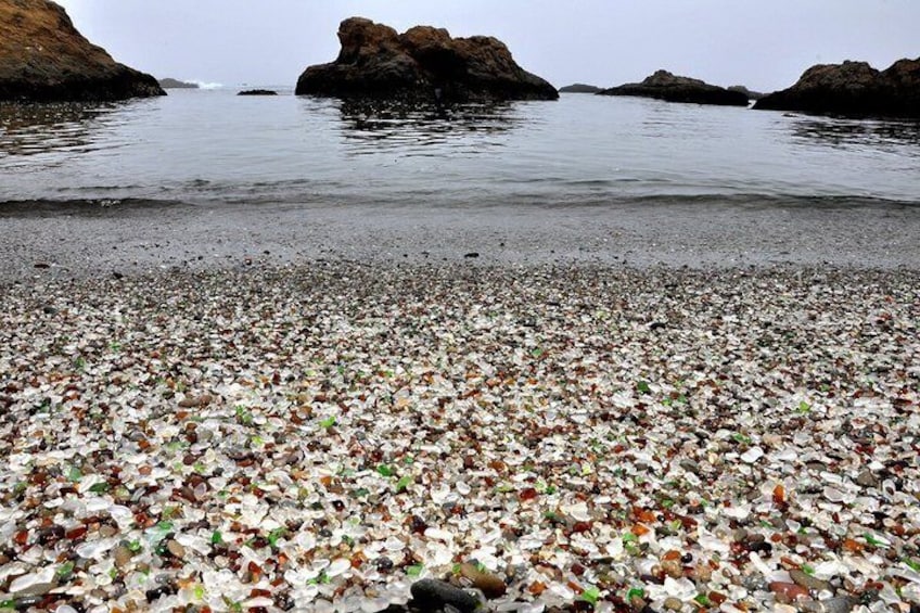 A beach with a large amount of litter. 5